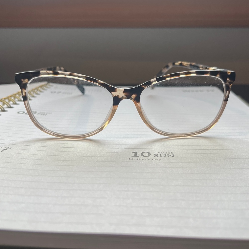 Tortoise eyeglass frames by Hip Optical